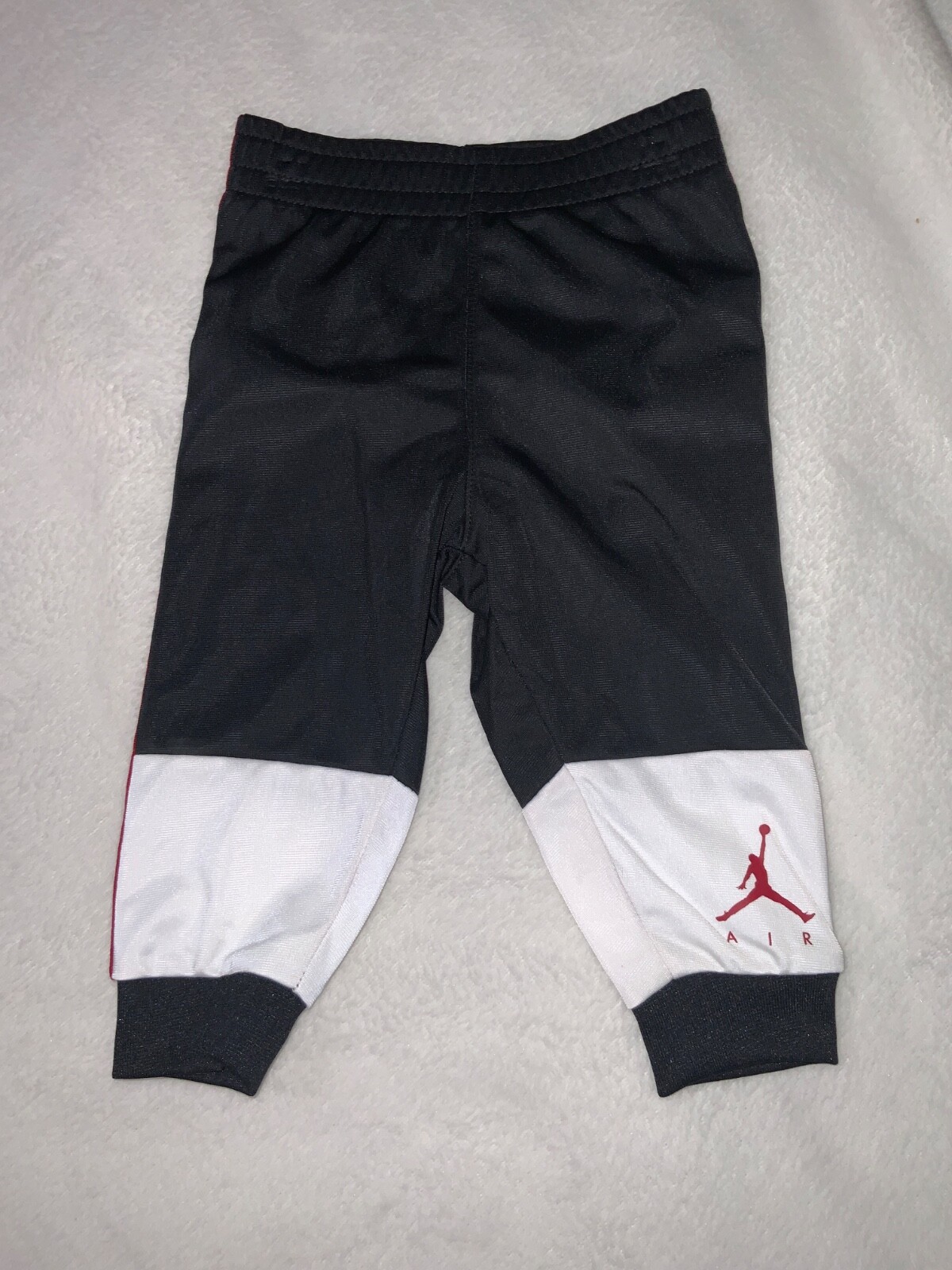 JORDAN BABY BOY JUMPMAN AIR BLOCKED TRICOT JACKET AND JOGGER SET 9 MONTHS