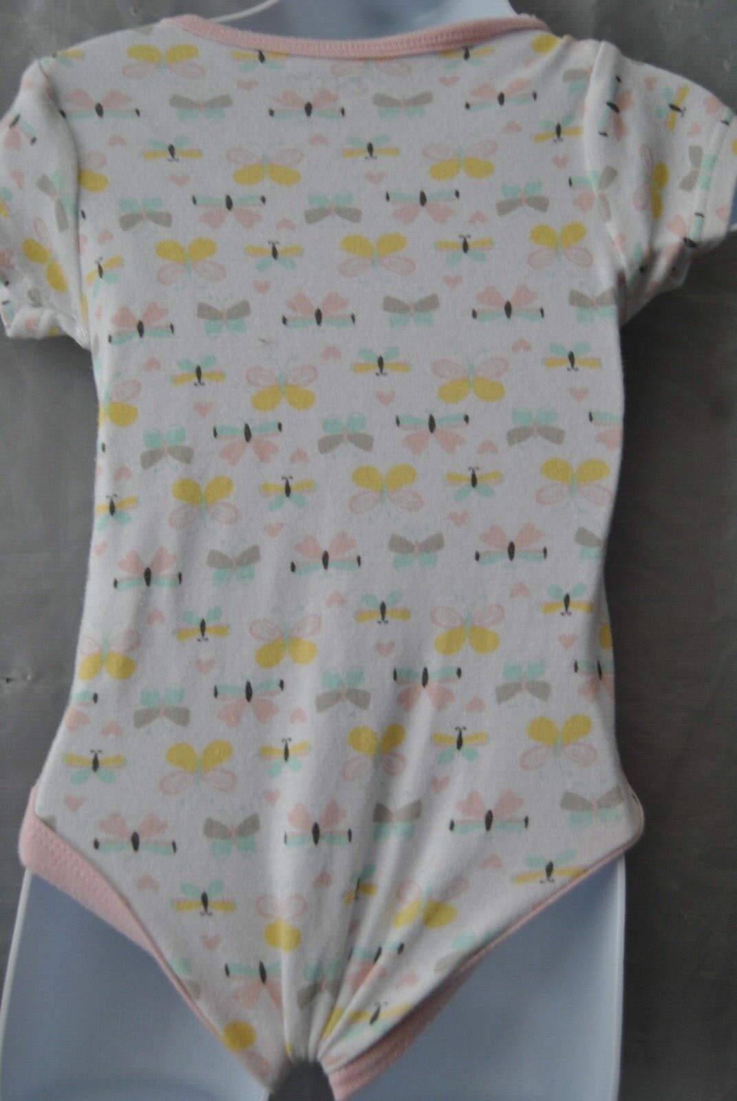 Girls One Piece by Baby Gear 18 M. Butterfly’s all on it. RN 100364