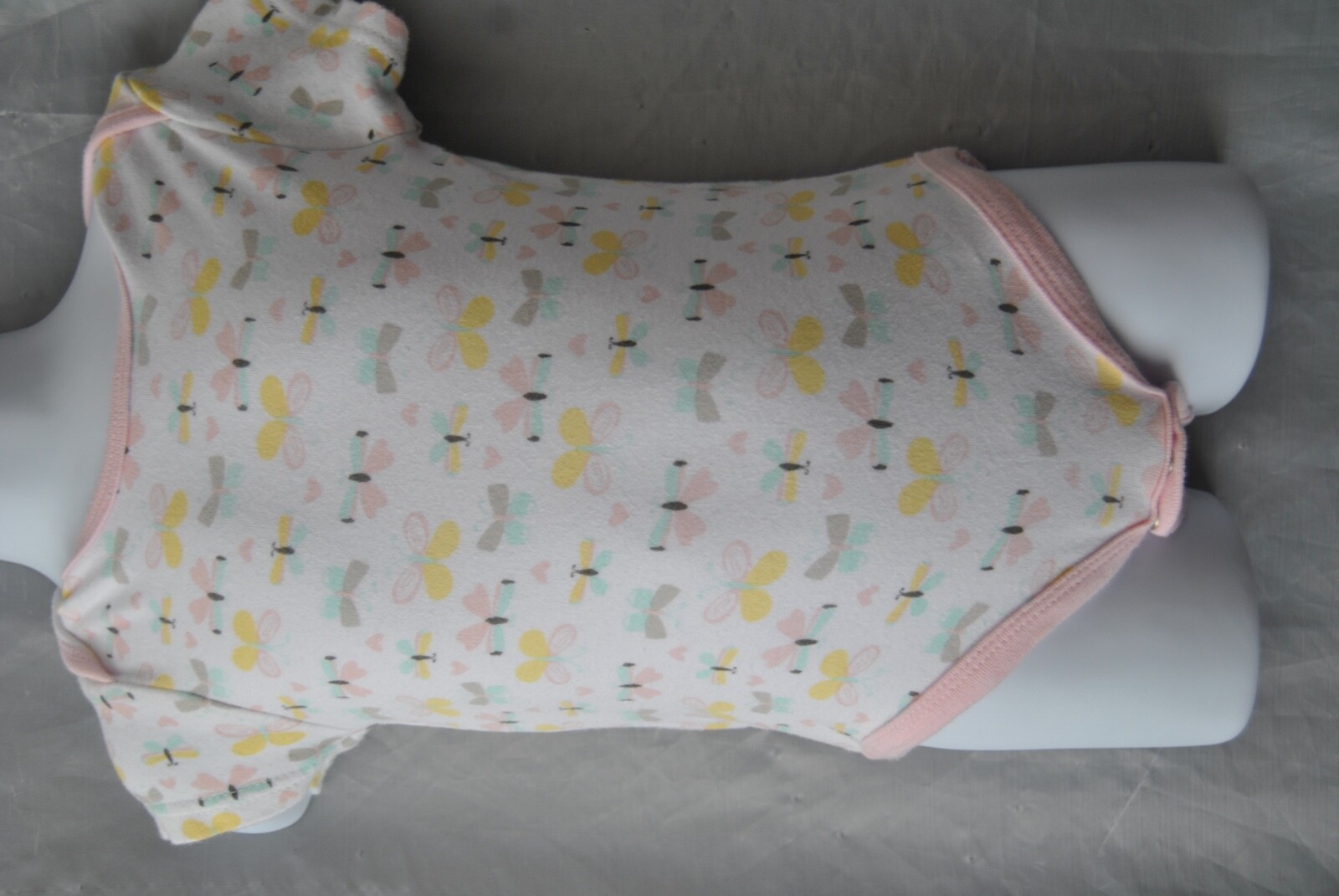 Girls One Piece by Baby Gear 18 M. Butterfly’s all on it. RN 100364