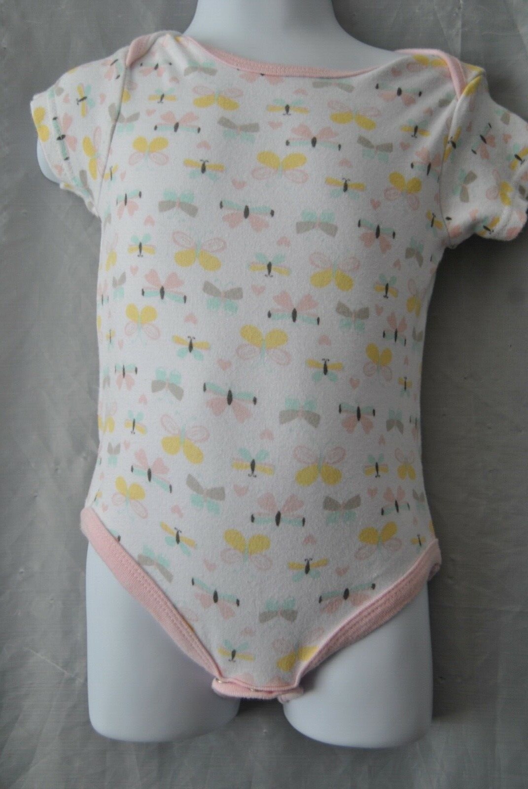 Girls One Piece by Baby Gear 18 M. Butterfly’s all on it. RN 100364