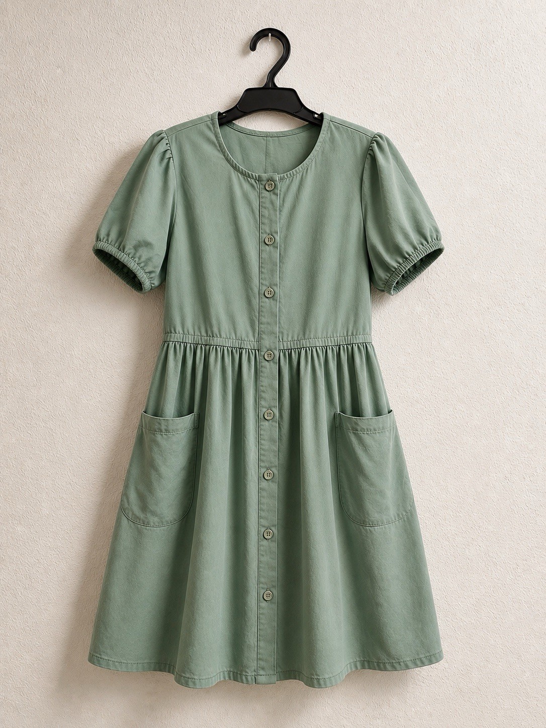 women’s short-sleeve button-front midi dress in a muted sage green color.