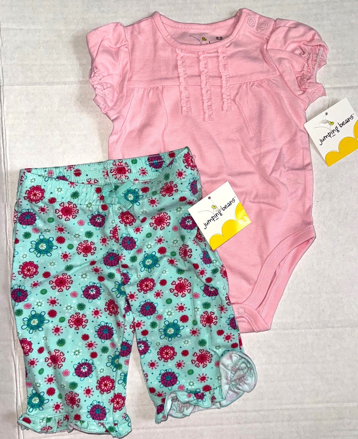 JUMPING BEANS 2 piece set pink/aqua/floral motif size 0-3 months