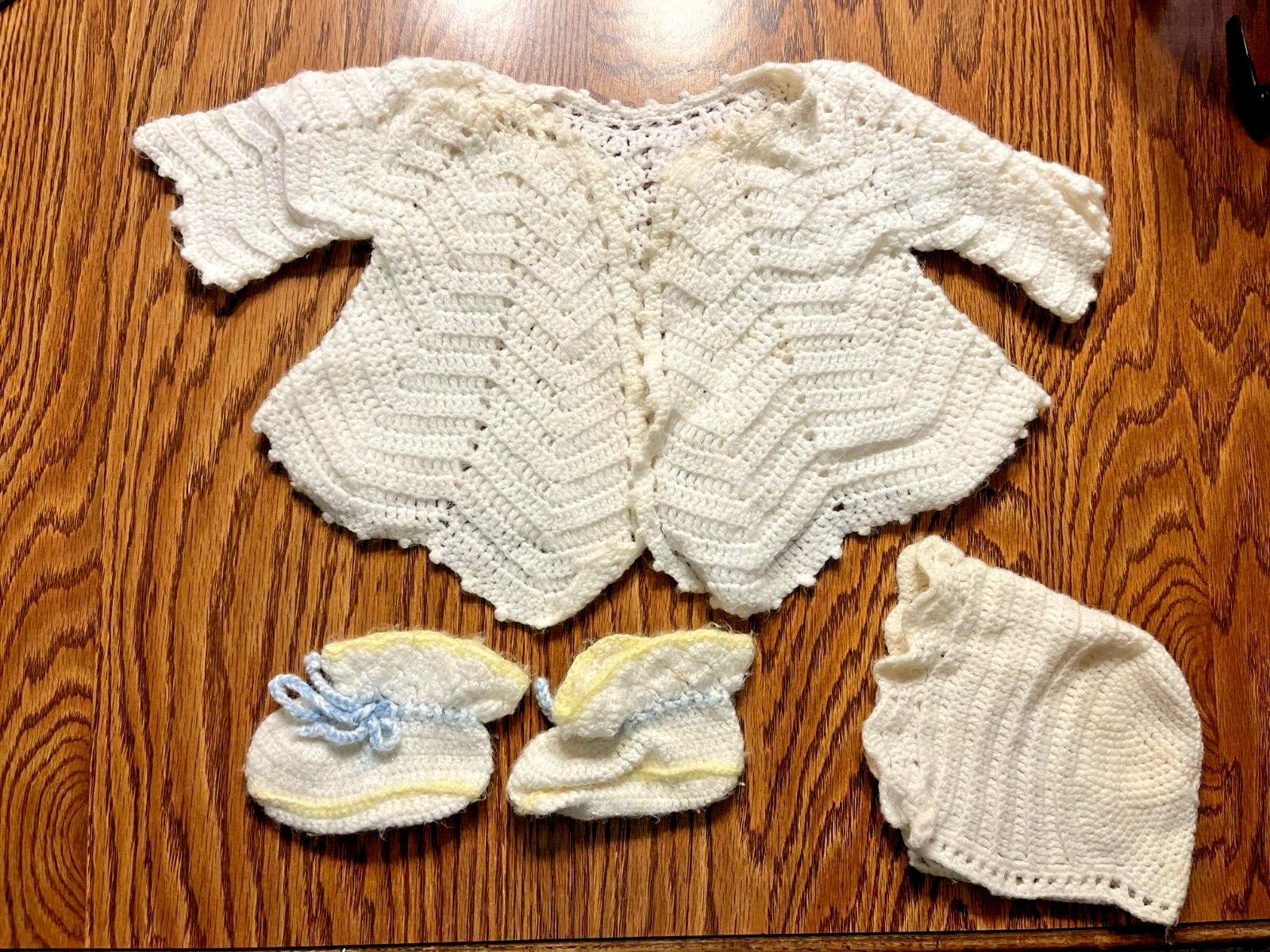 Baby layette set-white; includes sweater, hat, & booties (w/blue string & yellow