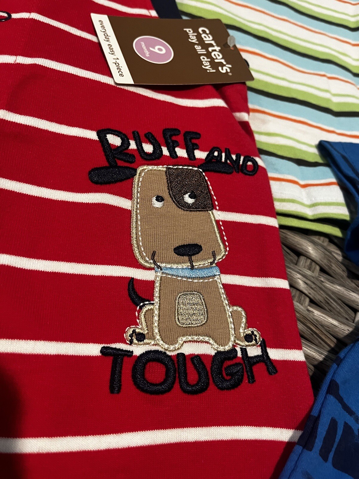 Carter’s 2 Rompers and 2 shirts Size 9M. See last Picture blemish on sleeve.