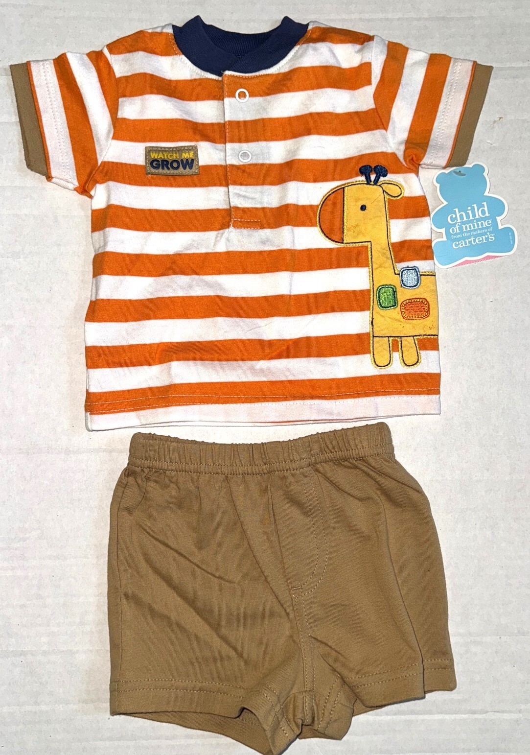 CARTERS Child of Mine 2 piece set tan/white/orange giraffe motif size 0-3 months