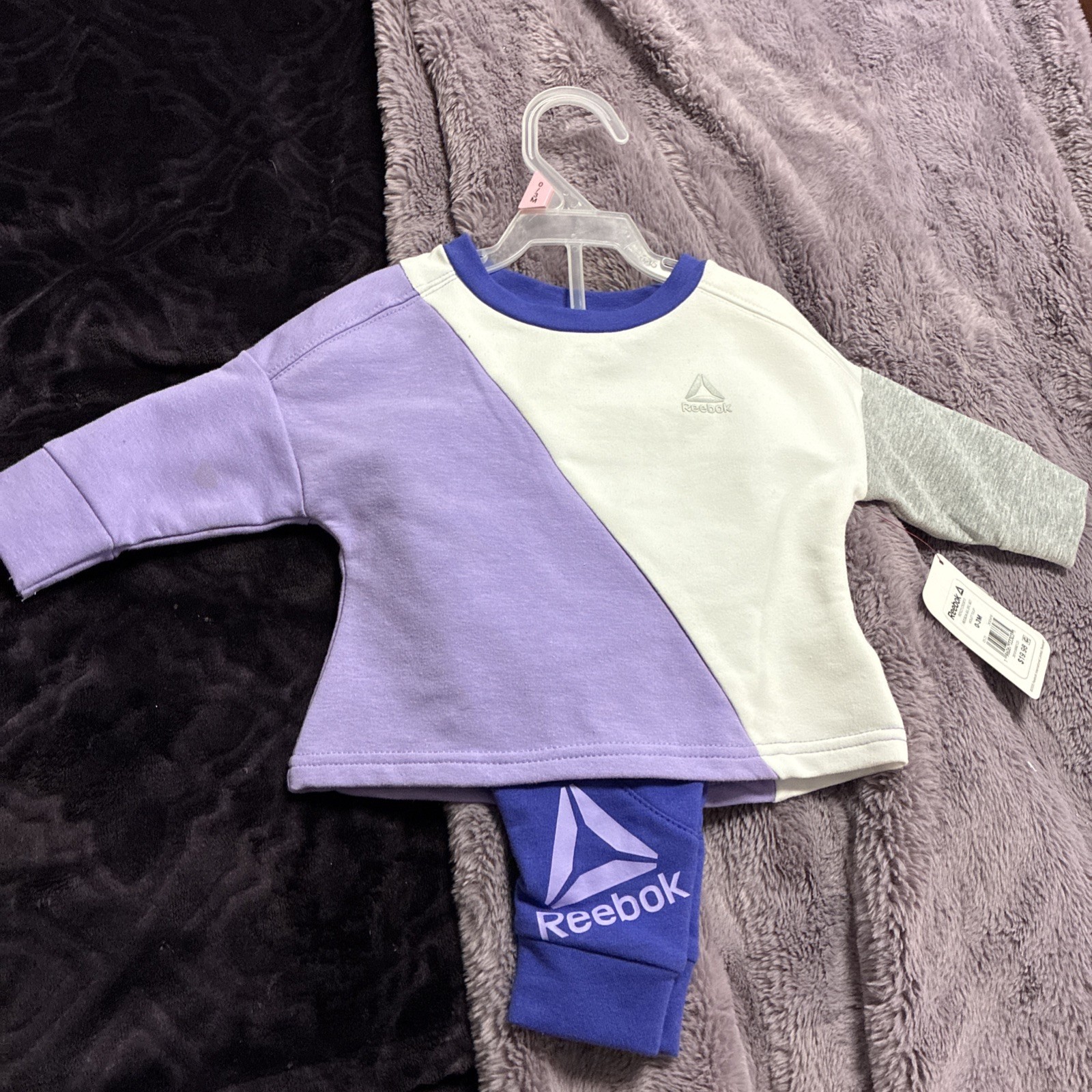 Reebok baby girl’s drop shoulder set,2 piece purple/white, size 0-3 months.