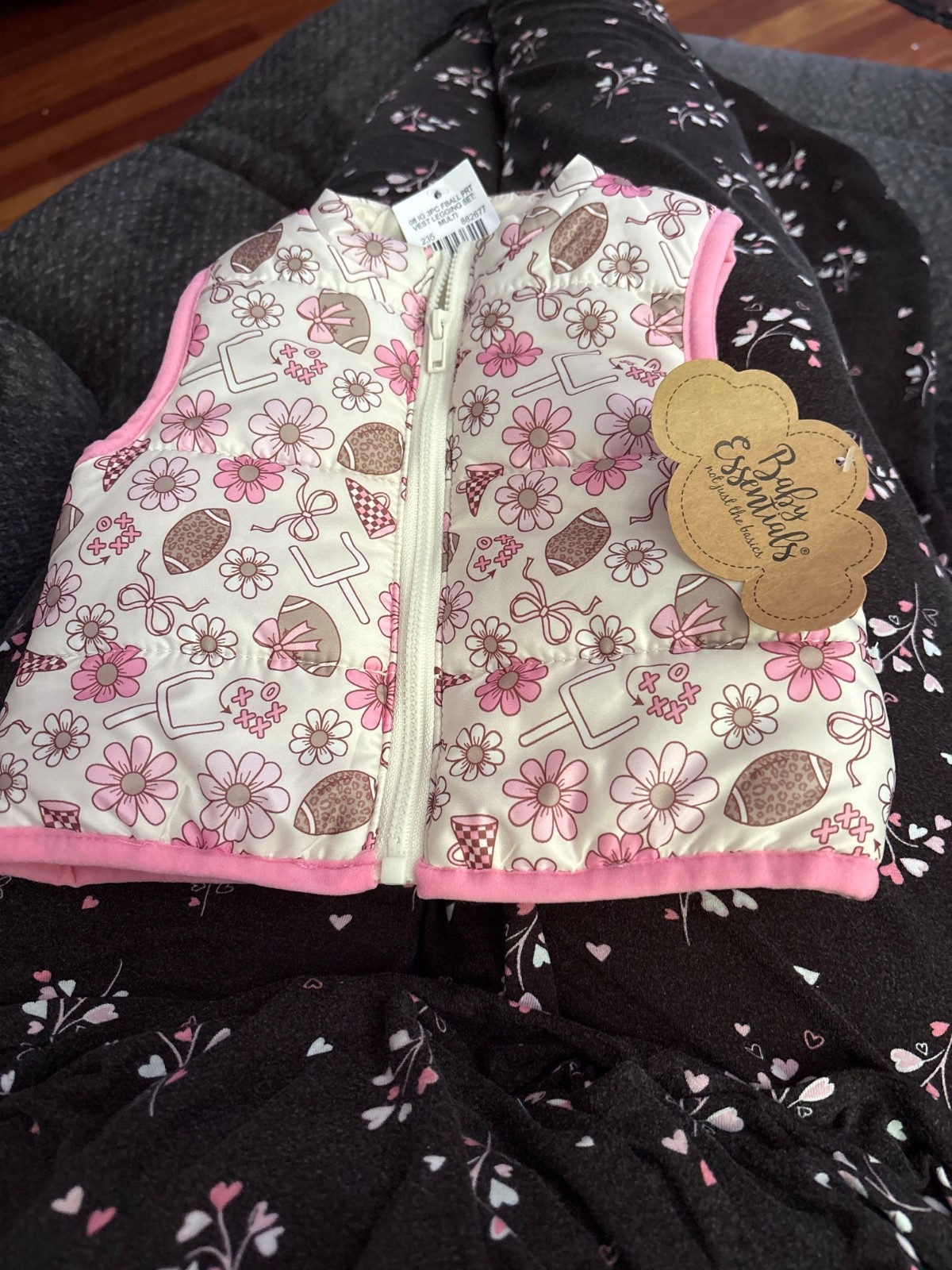 Baby essentials Baby Girls Football vest sz 6 mo. NWT