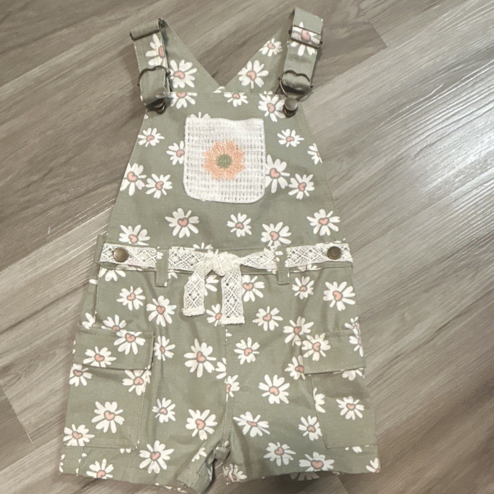 Girls Floral Sleeveless Romper with Bow Accents, Adjustable Straps, Front Pocket