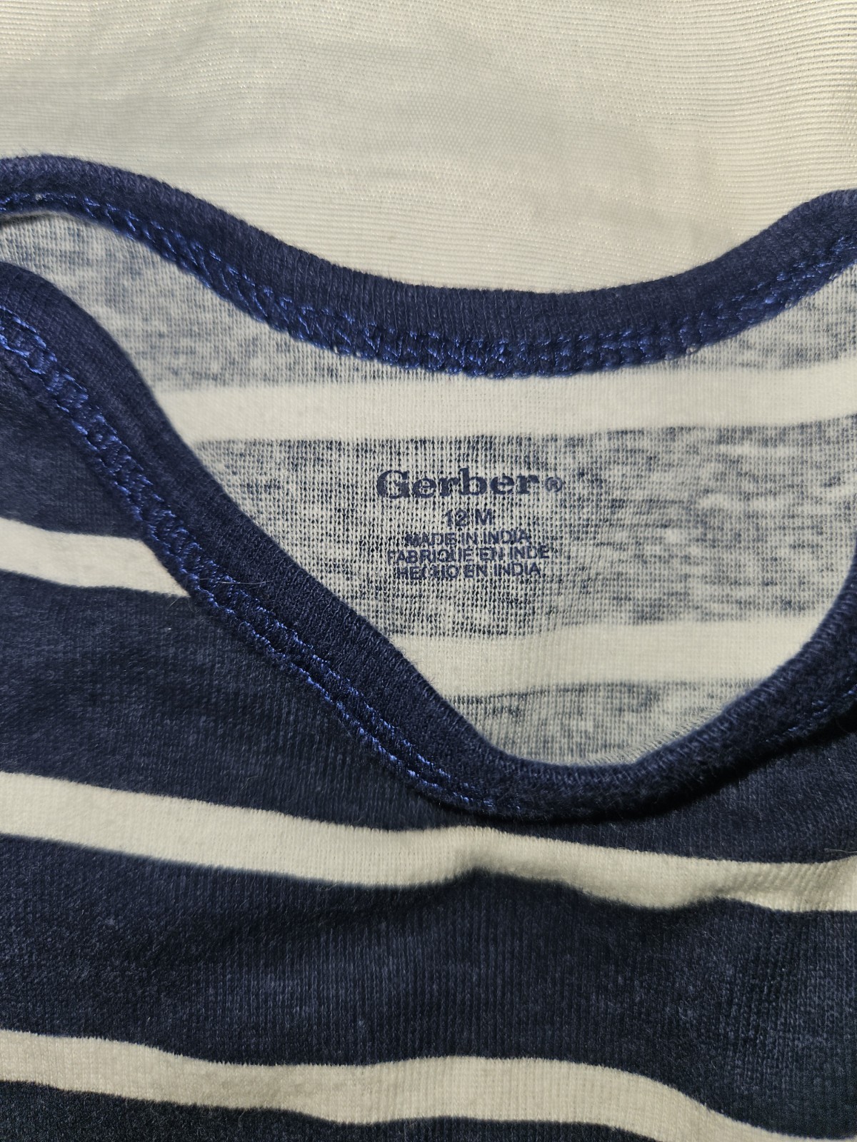 Boys 12 month blue and white striped Gerber Onsie. Short sleeve. (A7)