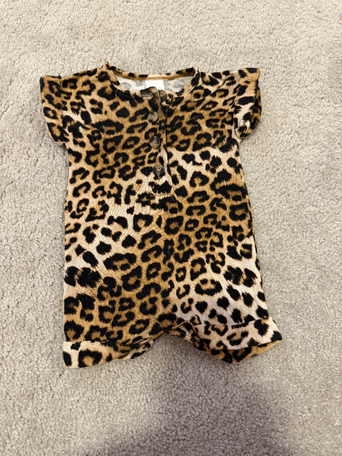 Lou Lou and Company size newborn girls cheetah romper.