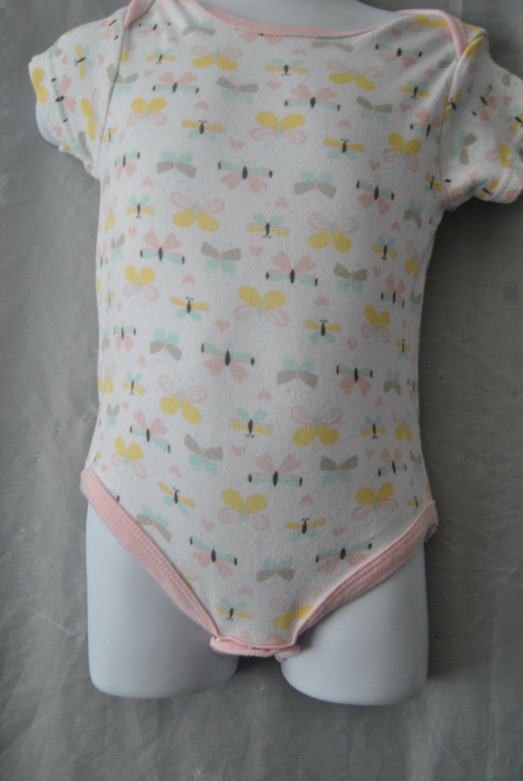 Girls One Piece by Baby Gear 18 M. Butterfly’s all on it. RN 100364